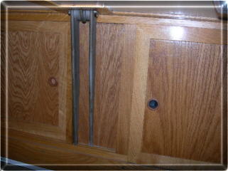 Panel to cover gaps between uprights